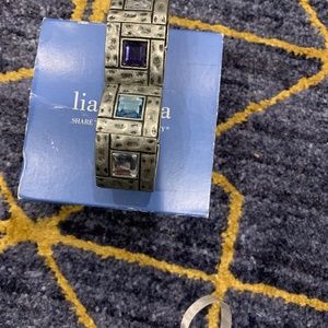 Lia Sophia Multicolor Stretch Bracelet w/ Square Rhinestones in the Center.